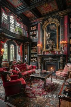 an ornate living room with red couches and chairs in front of a fire place