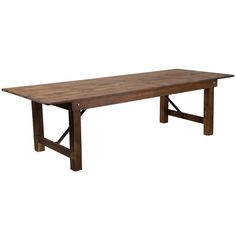 a large wooden table with metal legs