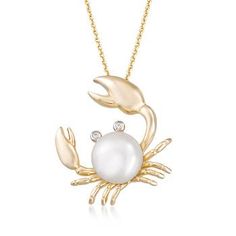 Set in 14kt yellow gold over sterling silver, this nautical crap pendant necklace features a 9mm cultured freshwater button pearl and diamond-accented eyes. There’s no way you can be crabby when you’re wearing this whimsical necklace. Item no. 848833 Crab Jewelry, Parrot Jewelry, Pendant Necklace Diamond, Necklace With Diamond, Detailed Necklace, Jewelry Appraisal, Gold Name Necklace