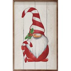 a painting of a santa clause with candy canes on it's nose and hat