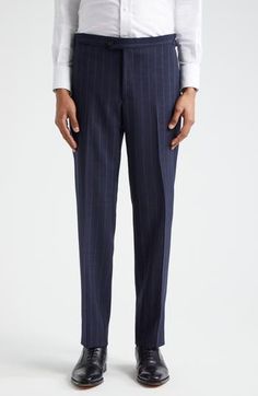 Pinstripes point up the precision tailoring of this structured suit cut from sumptuous wool in a single-breasted silhouette and framed with wide peaked lapels. Jacket has two-button closure; peaked lapels; four-button cuffs; chest welt pocket; front flap pockets; ticket pocket Trousers have zip fly with button-tab closure; front slant pockets; back button-welt pockets; adjustable waist Jacket is partially lined Trousers are unhemmed 100% wool Dry clean Made in Italy Designer Clothing Waist Jacket, Navy And Brown, Wool Suit, Welt Pockets, Welt Pocket, Mens Suits, Single Breasted, Designer Clothing, Dry Clean