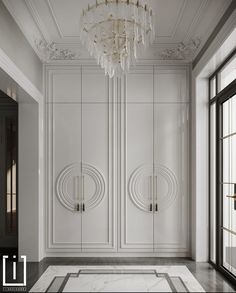 an elegant white room with chandelier and marble floors