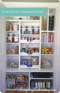 an organized pantry with white shelving and lots of food in baskets on the shelves