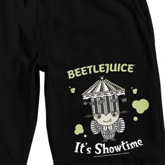 Get ready for a fun night's sleep with these men's black Beetlejuice sleep pajama shorts. Featuring an adorable chibi image of Betelguese wearing a whimsical circus tent hat and the iconic phrase "It's Showtime" in white letters below, these shorts are a must-have for fans of the classic movie. Crafted from cozy French terry fabric, they offer both comfort and durability. The drawstring adjustable elastic waistband ensures a perfect fit, making them ideal for a restful night's sleep. With easy-c Black Cartoon Print Sleepwear, Black Cartoon Print Sleepwear For Sleepover, Casual Black Sleepwear With Cartoon Print, Casual Black Pajama Shorts For Sleepover, Black Graphic Print Sleepwear For Bedtime, Black Graphic Print Sleepwear, Black Relaxed Fit Sleepwear With Graphic Print, Black Cotton Pajama Shorts For Bedtime, Black Pajama Shorts For Sleepover