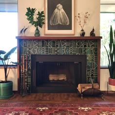 a living room with a fire place and potted plants on the fireplace mantel