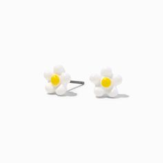 Look darling in daisies in these easy studs. The post-back earrings have a white daisy design with a yellow center. Finish: Silver-tone Closure: Post back Material: Plastic - Claire's White Daisy Stud Earrings