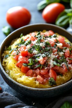 Spaghetti squash topped with diced tomatoes, fresh basil, and grated cheese in a bowl. Squash Meals, New Dinner Ideas, Garlic Parmesan Spaghetti Squash, Parmesan Spaghetti Squash, Delicious Spaghetti, New Dinner, Dinner Games