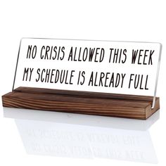 a sign that says no crisis allowed this week my schedule is already full