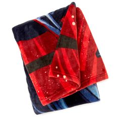 two red and blue towels folded on top of each other, one with white dots