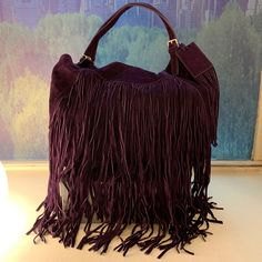 Mint Condition! Never Used. Beautiful Soft Suede - Fringe Is A Bit Crumpled From Storage But Straightens When Hanging. Luxury Women's Fringe Hobo Bag, Luxury Fringe Tote Shoulder Bag, Luxury Top Handle Shoulder Bag With Fringe, Luxury Purple Bags With Leather Handles, Luxury Shoulder Bag With Fringe, Elegant Shopping Bags With Tassels, Luxury Fringe Shoulder Bag For Travel, Luxury Fringe Bag For Shopping, Luxury Travel Shoulder Bag With Fringe