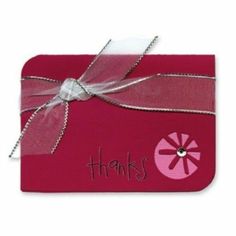 a thank card with a pink ribbon and bow on it's side, that says thanks