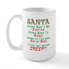 a white coffee mug with santa written on it