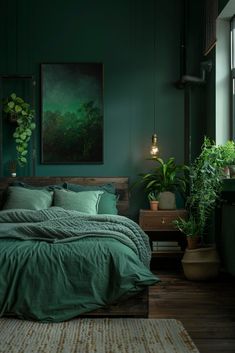 a bedroom with dark green walls and bedding, potted plants on the floor