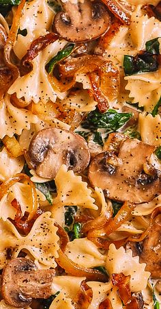 pasta with mushrooms and spinach in a pan