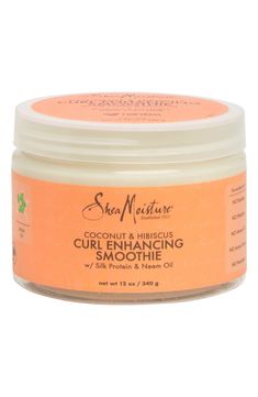 What it is: SheaMoisture's Coconut & Hibiscus Curl Enhancing Smoothie is enriched with natural ingredients to give you soft, silky and defined curls! Enriched with certified organic Shea Butter, this conditioning enhancing smoothie blends the tropical richness of Coconut Juice and Oil with other choice oils for a truly unique hydrating experience. In fact, this SheaMoisture curly hair formula is so rich, all you need is a little dab to instantly smooth those unruly split ends. It also works wond Hydrating Smoothie, Shea Moisture Curl Enhancing Smoothie, Shea Moisture Coconut, Hair Smoothie, Coconut Juice, Oil For Curly Hair, Hair Formula, Curl Enhancing Smoothie, Coconut Hibiscus