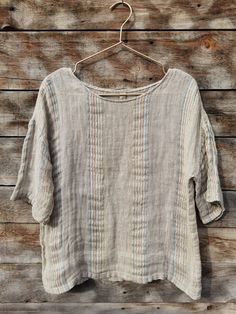 Linen blouse made from 100% pure linen. You can choose back lenght. We can make any size on your request, please do not hesitate to contact us. For seeing more tops and shirts photos: https://www.etsy.com/listing/955229392/linen-top-linen-tunic-handmade-linen?ref=shop_home_active_1&frs=1 Linen is one of the strongest and most durable natural fibers - the ancient Egyptians used linen for mummification, and the US uses it blended with cotton for dollar bills! Linen fabric is usually a low-thre Bohemian Linen Tops With Relaxed Fit, Bohemian Linen Relaxed Fit Tops, Bohemian Beige Linen Top, Beige Bohemian Ramie Top, Casual Beige Ramie Tops, Summer Linen Blouse In Neutral Color, Neutral Linen Summer Blouse, Beach Linen Beige Blouse, Summer Neutral Linen Blouse