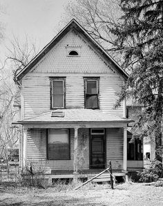 black and white photograph of an old house