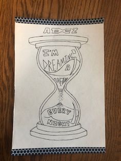 a drawing of an hourglass with the words i'm dreaming every night on it