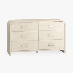 a white dresser with six drawers