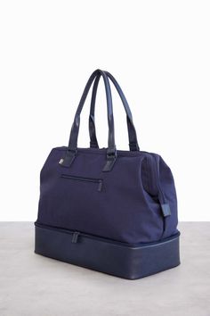 Navy Weekender Bag | Béis Functional Duffle Bag With Removable Pouch For On-the-go, Practical Large Capacity Travel Accessories For On-the-go, Functional Diaper Bag With Luggage Sleeve, Functional On-the-go Diaper Bag With Luggage Sleeve, Functional Tote Luggage With Removable Pouch, Functional Tote Travel Accessories With Removable Pouch, Functional Travel Tote With Removable Pouch, Functional Travel Bag With Removable Pouch For Weekend Trips, Functional Tote Duffle Bag For Daily Use