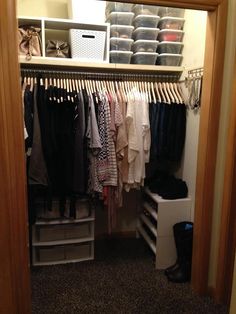 the closet is full of clothes and other things to wear in it's storage area