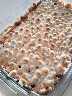 a casserole dish with marshmallows in it