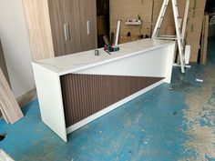 a white and brown counter in a room