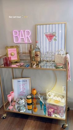 a bar cart filled with drinks and personal items