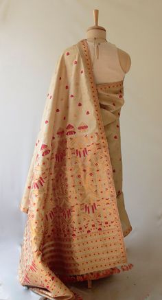 MADE TO ORDER ONLY  This is hundred percent authentic Muga Silk Saree . It has Muga silk in the warp and weft .   The interwoven motif yarns are in Guna (tested golden zari ) and the red motifs are in mercerised cotton . The design is traditional and can be considered as bridal .  Muga Silk - The most valued silk from India. Almost exclusively reared and produced in Assam, India. It is indigenous to the Brahmaputra Valley and assiduously practiced in the districts of Assam. The moth is basically Light Brown Colour, Saree Designs Party Wear, Brown Colour, Unique Products, Golden Yellow