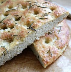 two pieces of bread with sprigs on them