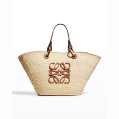 Loewe basket tote bag in woven Iraca palm leaf and calf leather. From the Paula's Ibiza Collection. Two sets of top handles. Anagram logo at front. Made in Spain. French Wardrobe Basics, Loewe Bag, Leather Artisan, Basket Bag, Instagram Photography, Wardrobe Basics