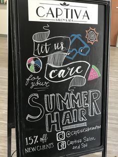 a chalkboard sign with writing on it in front of a store called captiva