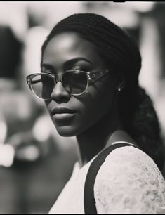 Behind her tinted sunglasses lies a story as deep as the ocean. Just like my mom's pair, which saw countless sunsets, they whisper tales of quiet strength and bold futures. Discover your narrative with a pair from Sunglass Kiss. Tinted Sunglasses