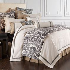 the comforter is made up and ready to be used in any room with it's bedding