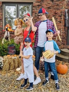 a family dressed up in costumes for halloween