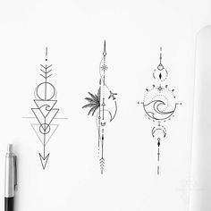 three different tattoo designs on a white wall next to a pen and ink drawing tablet