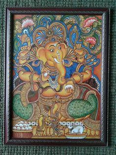 an elephant painting on the wall in a wooden frame with green carpet and blue background