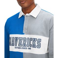 Upgrade your rotation of official Dallas Mavericks gear with this Ronnie Rugby Long Sleeve T-Shirt from Tommy Jeans. Not only does it feature an embroidered applique of the team's logo on the chest, but there is an additional logo behind the collar in a small contrast-color section. The three-button placket makes this long sleeve top the perfect option for formal and informal Dallas Mavericks events. Embroidered fabric applique Officially licensed Machine wash, tumble dry low Material: 100% Cott Sporty Gray Color Block Tops, Gray Varsity Cotton Top, Gray Cotton Varsity Top, Gray Varsity Top For College, Heather Grey Graphic Print Top For College, Sporty Heather Grey Tops For College, Fabric Applique, Dallas Mavericks, Embroidered Applique