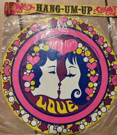 a plastic bag that has some kind of sticker on it with two women kissing each other