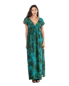 The Shoreline Long Dress is in a traditional rayon batik. It is a technique of wax-resist dyeing applied to the whole rayon cloth. This technique originated from the island of Java, Indonesia. It features a deep V neck design, cap shoulders and a tie right underneath the chest. It also has two side pockets and two small slits at the bottom hem which falls right at the ankle. This dress will elevate your look instantly. Green V-neck Batik Print Dress, Green Hawaiian V-neck Dress, Green Batik Print V-neck Dress, Casual V-neck Batik Print Maxi Dress, Resist Dyeing, V Neck Design, Wax Resist, Batik Dress, Maternity Swimwear