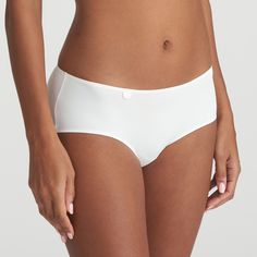 These shorts have been glued, not stitched, to ensure a fully seamless fit. The ultra-light fabric ensures a wonderfully comfortable fit with no visible lines. A subtle softer take on white, Natural looks great against any skin type. White Smoothing Elastane Bottoms, White Smoothing Bottoms, Modern White Short Bottoms, Fitted White Brief Shorts, White Fitted Brief Shorts, White Elastane Short Leg Bottoms, White Elastane Bottoms With Short Legs, Elegant White Bottoms With Soft Touch, Elegant Short Length Bottoms With Soft Touch