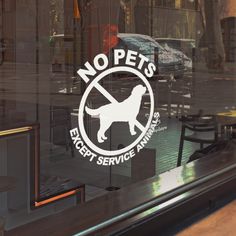 no pets except service animals sign in the window