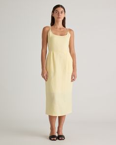 Crafted from the finest quality linen sourced from Europe, our 100% European Linen Scoop Neck Midi Dress is soft, breathable, and lightweight, making it the perfect choice for warm weather. The elegant scoop neck and midi length of the dress make it a versatile addition to any wardrobe. Whether you're dressing it up for a special occasion or keeping it casual for a day out, this dress is sure to turn heads.  | Quince | Women's 100% European Linen Scoop Neck Midi Dress in Soft Yellow, Size XS Scoop Neck Midi Dress, Silk Cami, Wide Leg Linen Pants, Soft Yellow, European Linens, Fitted Skirt, Linen Women, Blouse Dress, Linen Dress