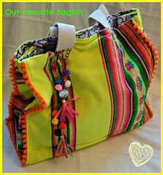 a colorful purse with tassels and beads on it