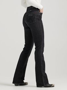 EVERY COWGIRL’S GO-TO Trends may come and go, but the bootcut is forever. Our Women’s Wrangler Retro® Bailey High Rise Bootcut Jean sets the bar high with a waist-nipping silhouette, a close fit through the thigh, and a slightly flared 17” leg opening that goes perfectly over boots. It’s crafted from cotton with just a subtle amount of stretch for comfort. Plus, the signature five-pocket styling, “W” stitching, and rope logo patch deliver the Western authenticity you want. Western Bootcut Jeans, Jeans With Black Boots, Pnw Fashion, Wrangler Women, High Rise Bootcut Jeans, Bootcut Jean, Wrangler Jeans, Bootcut Jeans, Patch Logo