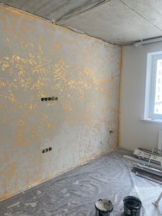 a room that has some paint on the walls