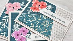 some cards with flowers and words on them