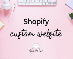 a desktop computer sitting on top of a pink desk with the words shopify custom website