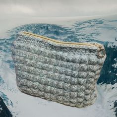 About this item: Crochet toiletry bag, makeup bag, aesthetic handmade crochet pouch, limited, one of a kind handcraft. Inspired by the mighty glacier, although it is melting fast, the glacier is an important historical and necessary element for my country Norway. This homemade one-of-a-kind crochet toiletry/makeup bag is made from quality items and a big amount of love for crafting from me. Either this is purchased for yourself or as a gift to someone dear, i hope this item brings a genuin smile Hand Knitted Pouch Bag As A Gift, Handmade Clutch Cosmetic Bag For Gift, Crochet Pouch Bag As A Gift, Handmade Crochet Clutch Bag For Gift, Handmade Everyday Rectangular Pouch, Handmade Crochet Pouch Bag For Travel, Crochet Pouch Clutch As Gift, Handmade Crochet Clutch Bag For Travel, Handmade Crochet Clutch For Travel