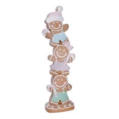 three ceramic figurines are stacked on top of each other in the shape of a tower